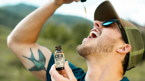 man with CBD oil